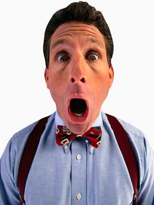 Photo of a man with a look of surprise on his face