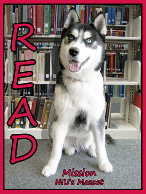 Poster of NIU mascot Mission in front of library books