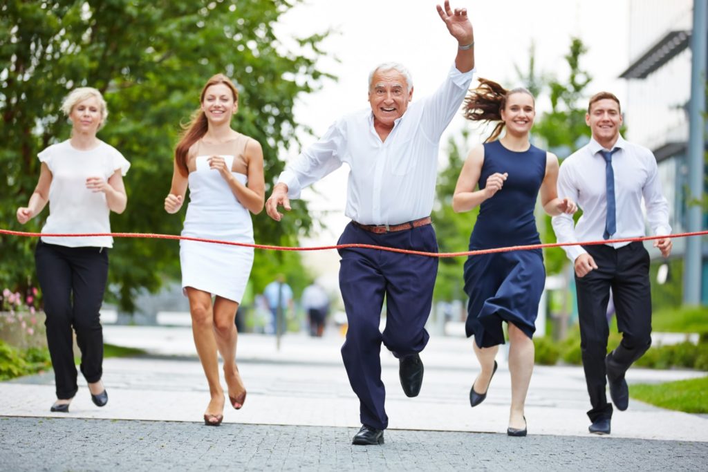 Senior manager taking leadership in business race